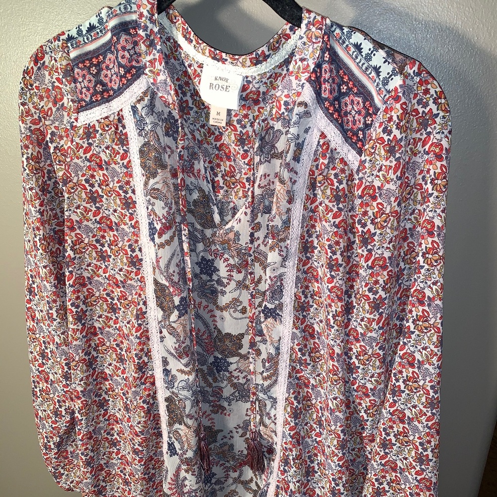 Adorable floral long sleeve blouse with tassels
